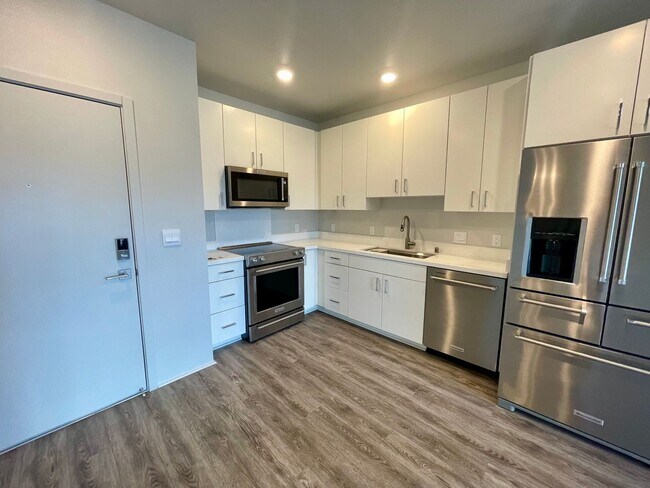 Building Photo - AVAILABLE MID-JUNE! BRAND NEW 1-Bedroom in...
