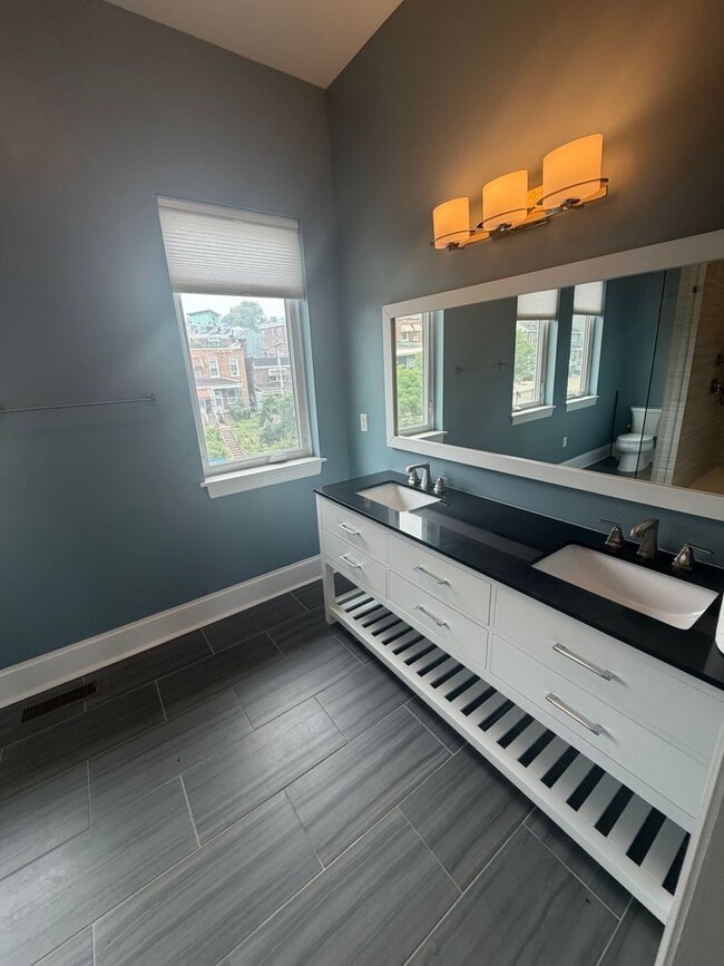 Building Photo - Luxury 3 Bedroom Condo in the Heart of Lawrenceville