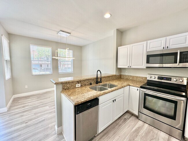 Building Photo - Corner Unit Two Story Townhome in the Beau...