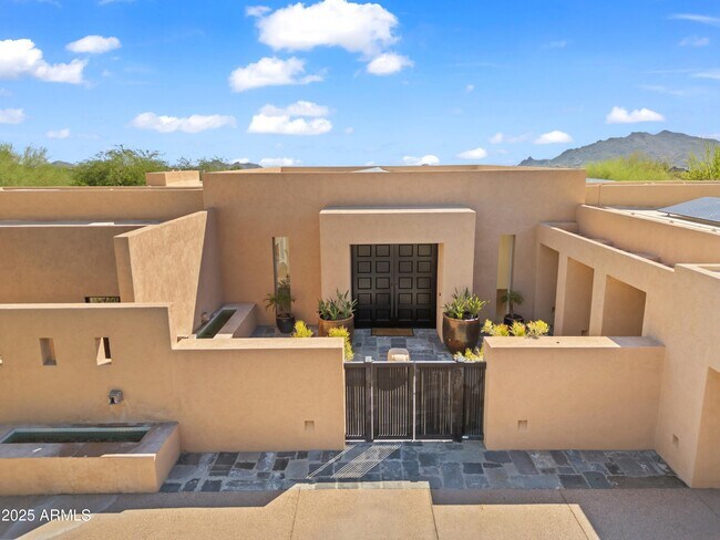 Building Photo - 9191 E Happy Hollow Dr