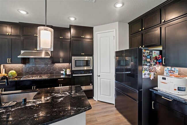 Building Photo - 11307 Cosmopolitan Dr