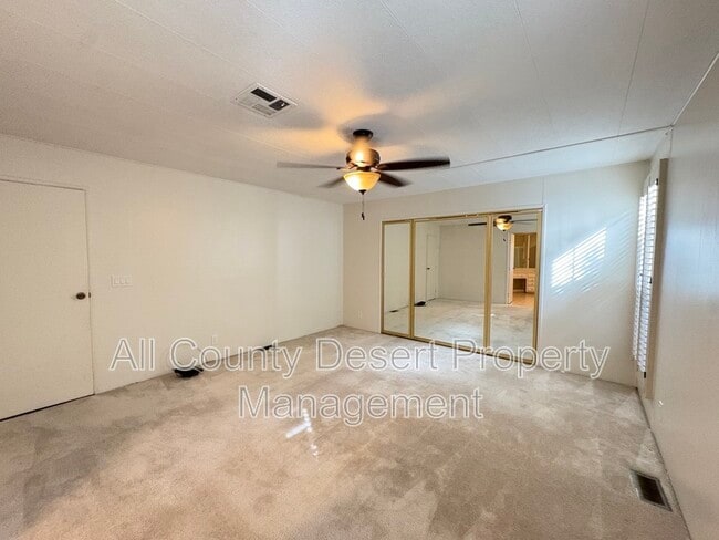 Building Photo - 38251 Desert Greens Dr E