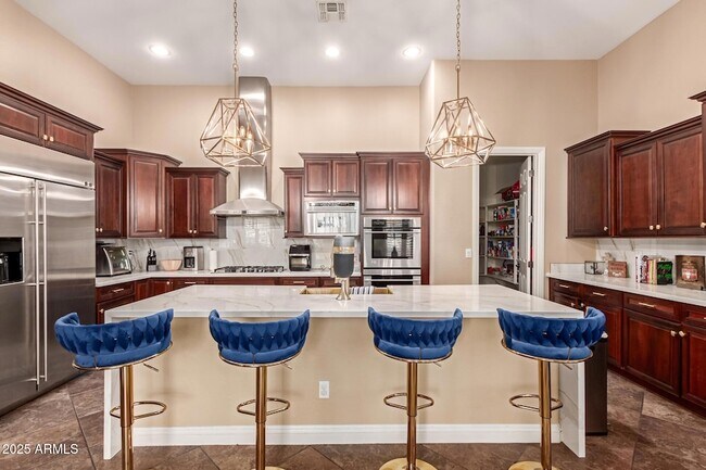 Building Photo - 4935 W Yearling Rd