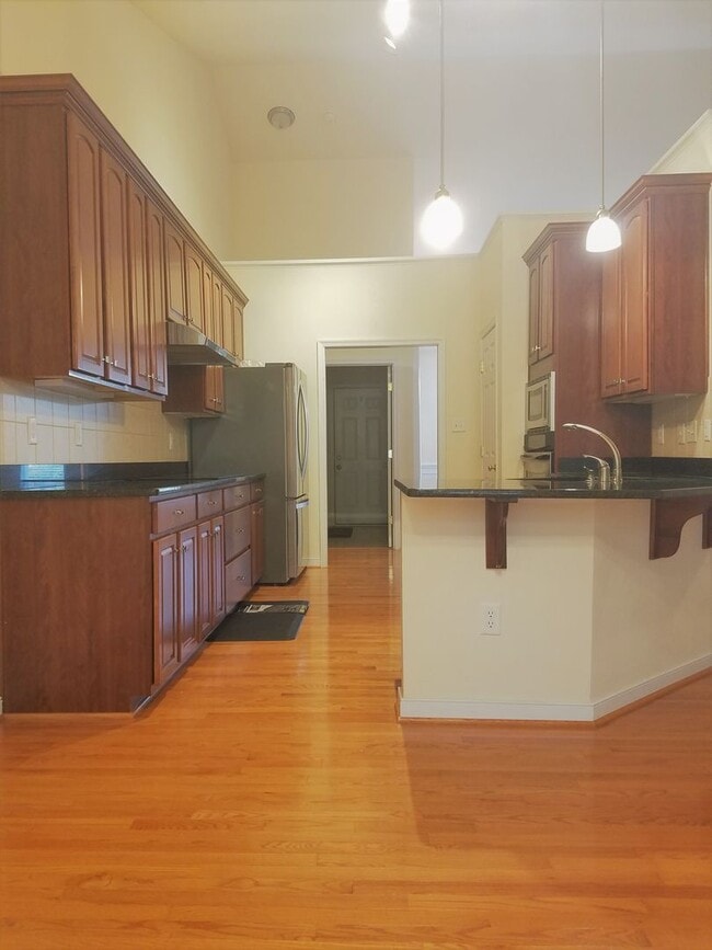 Building Photo - Beautiful transitional 4 bedroom brick rancher on quiet street just off of Hull Street/Genito Roa...