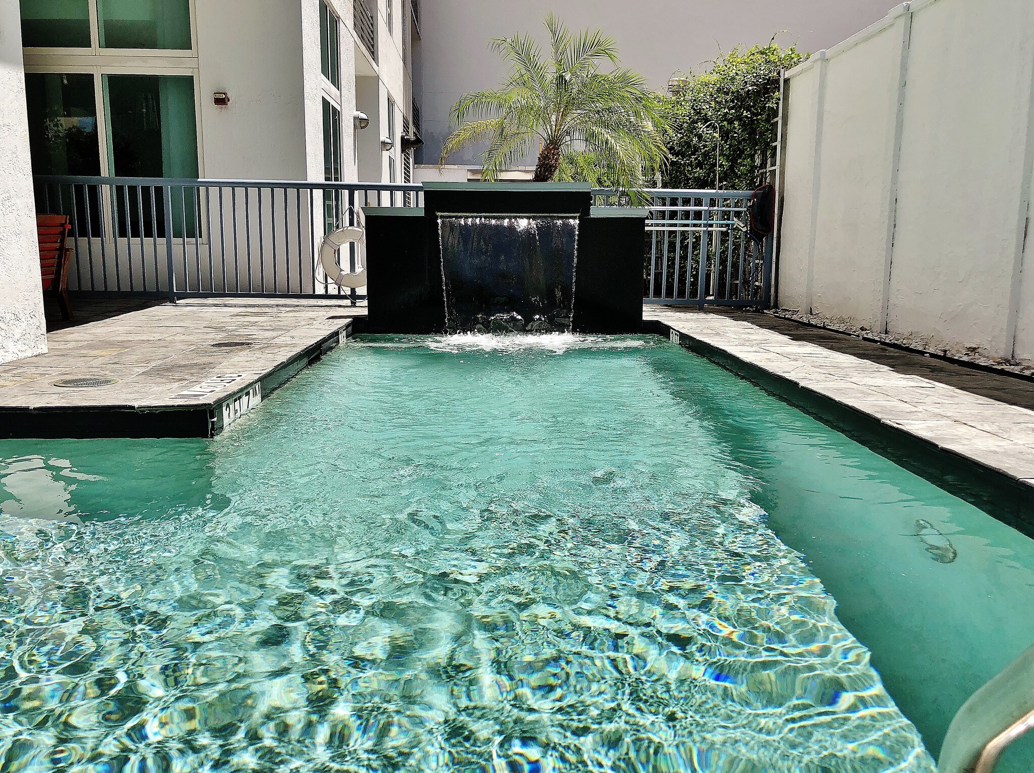 Building plunge pool and sitting area - 234 NE 3rd St