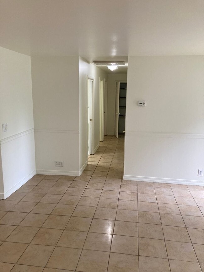 Building Photo - Cozy 4-Bedroom 1.5 Bath Gem with Fenced Ya...
