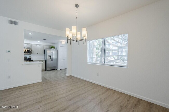 Building Photo - 9455 E Raintree Dr
