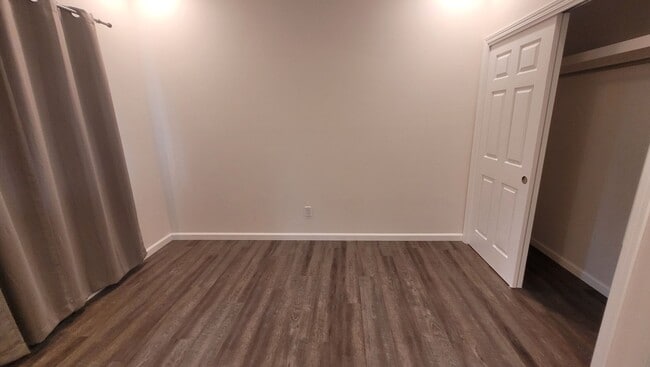 Building Photo - This 3-bedroom, 2-bath home in Orchidland Subdivision