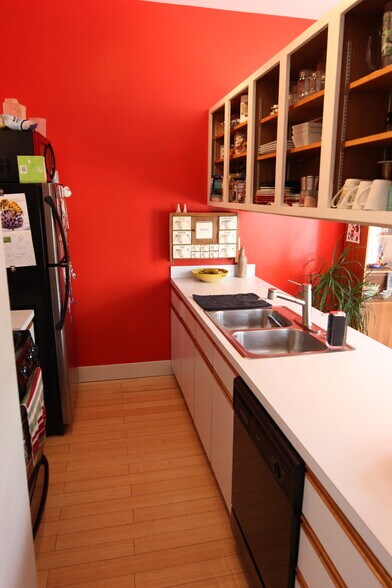 Kitchen features gas stove and oven, dishwasher, fridge, and disposal. - 1626 Carroll St