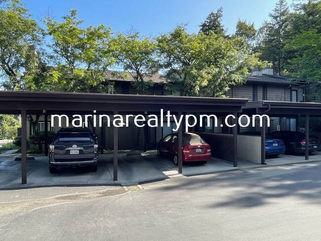 Building Photo - Two Story Crockett Condo Two-Off Street Pa...