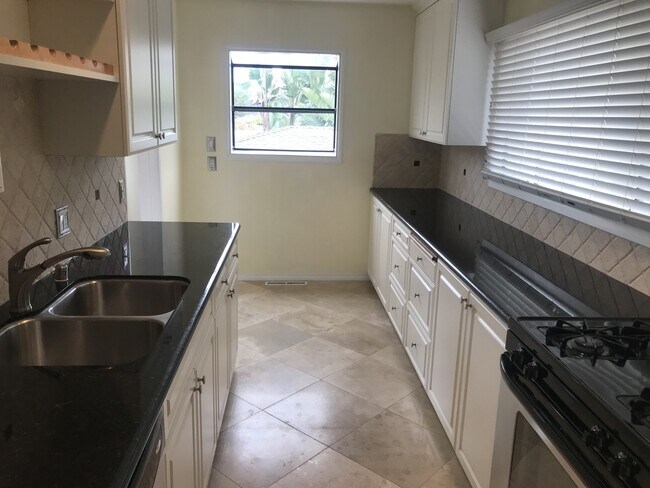 Building Photo - Beautiful Remodeled House with Large Fenced Lot and Big Garage