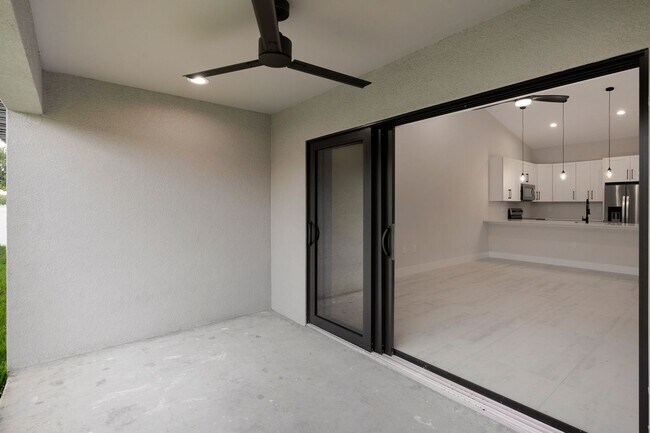 Building Photo - 2023 Duplex All tiled - 3 Bedroom Plus Den/2 Bath & 2 car Garage