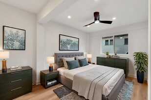 Staged bedroom - 20th St. Apartments