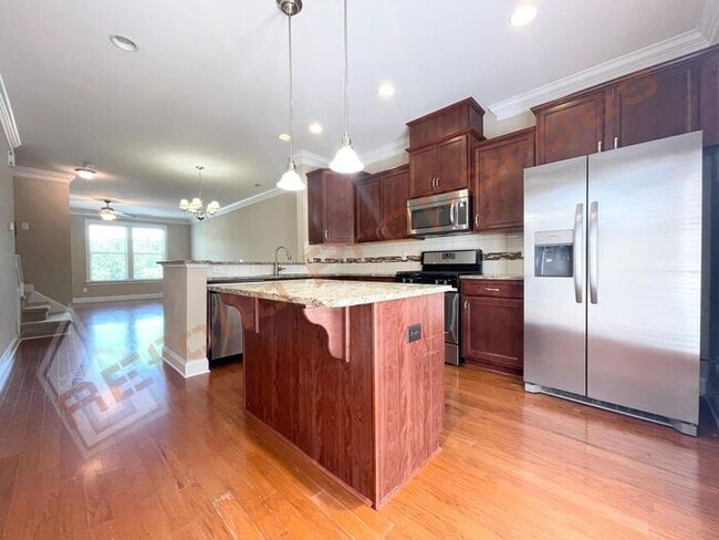 Building Photo - Lovely 3 Story 3 Bedroom 3.5 Bath 1 Car-Ga...