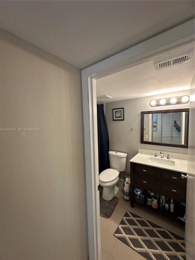 Building Photo - 9491 Palm Cir S