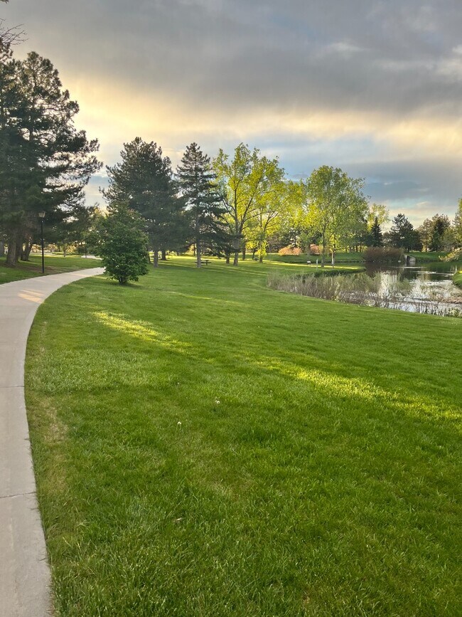 Building Photo - Backing to Greenbelt with Pools and Trails...