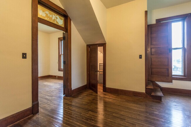 Entry foyer with Harry Potter cupboard - 715 E 10th St