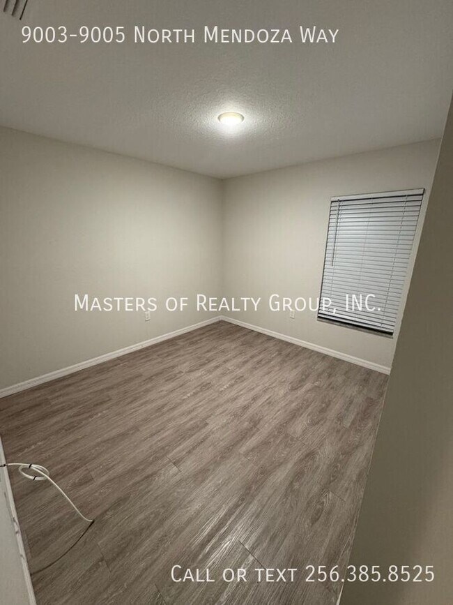 Building Photo - 9003-9005 North Mendoza Way-