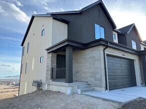 Building Photo - INVERNESS - BRAND NEW LUXURY ROW END THOUSE W 2 CAR GARAGE