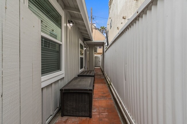 Building Photo - Beachside 3BR Home | Remodeled | AC | Garage Parking | Walk to Boardwalk