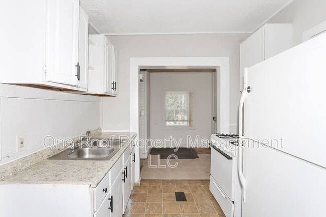 Building Photo - 3228-3230 E 8th St.