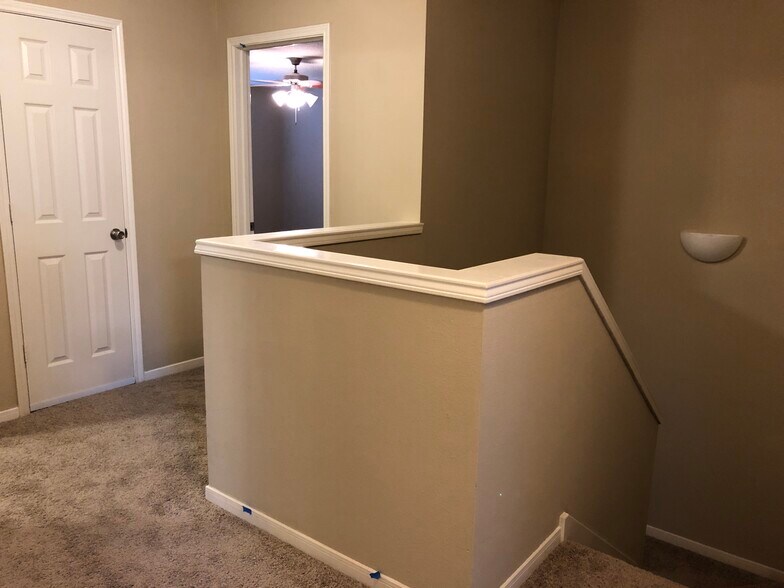 A view of the upstairs landing. - 17359 Turquoise Stream Dr