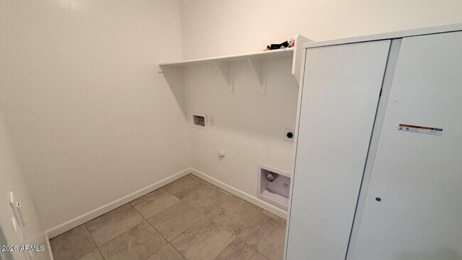 Building Photo - 40145 W Hillman Dr