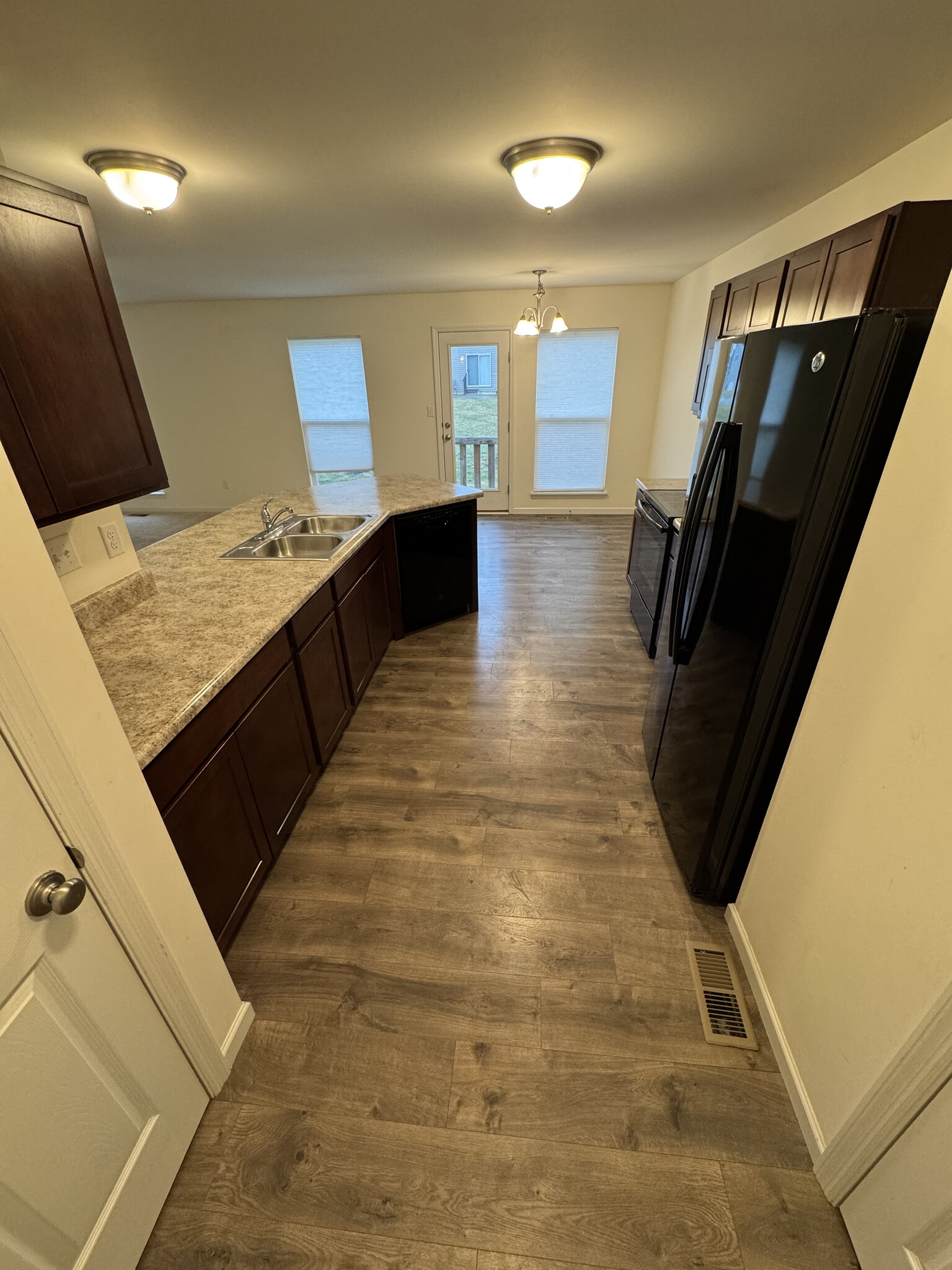 Kitchen from garage door - 502 Peruque Commons Ct