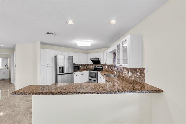Building Photo - 5911 NW 59th Ave