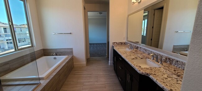 Building Photo - Stunning home with luxurious wood floor and beautiful spacious yard