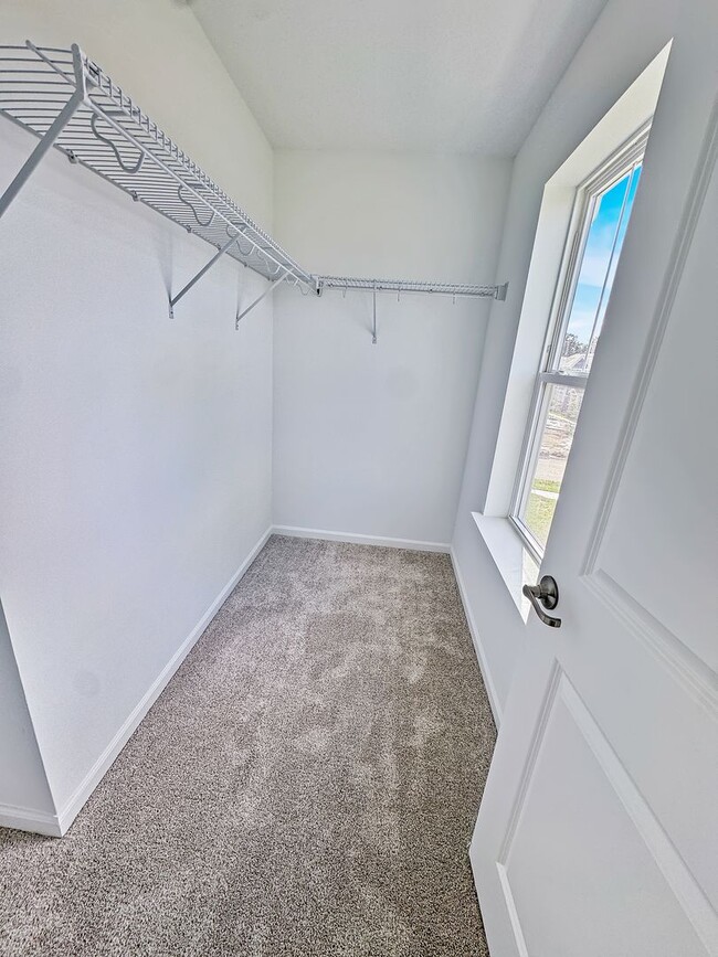 Building Photo - Step into modern living with this brand-ne...
