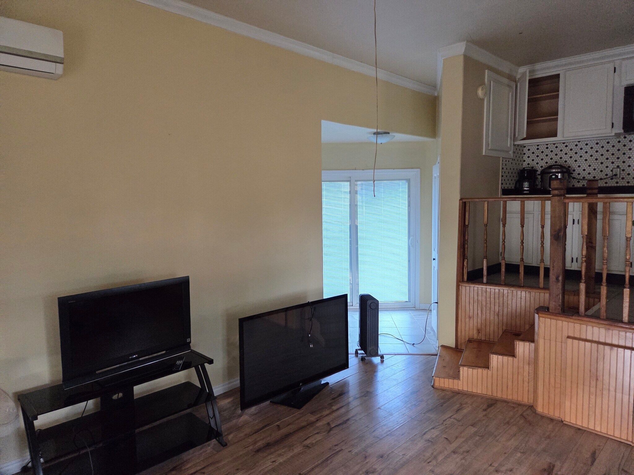Kitchen is up the small flight of stairs - 4124 Limestone Rd