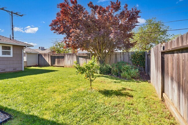 Building Photo - 3BR + Office Home in Excellent Condition with Storage Sheds and Garage Workspace!