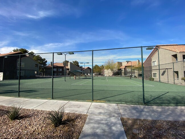 Building Photo - Charming 1 Bed/1Bath  2-Story Condo nestled in this Beautifully Gated Community in Spring Valley!