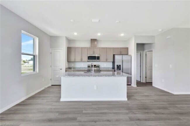 Building Photo - 1310 NW Juanita Pl