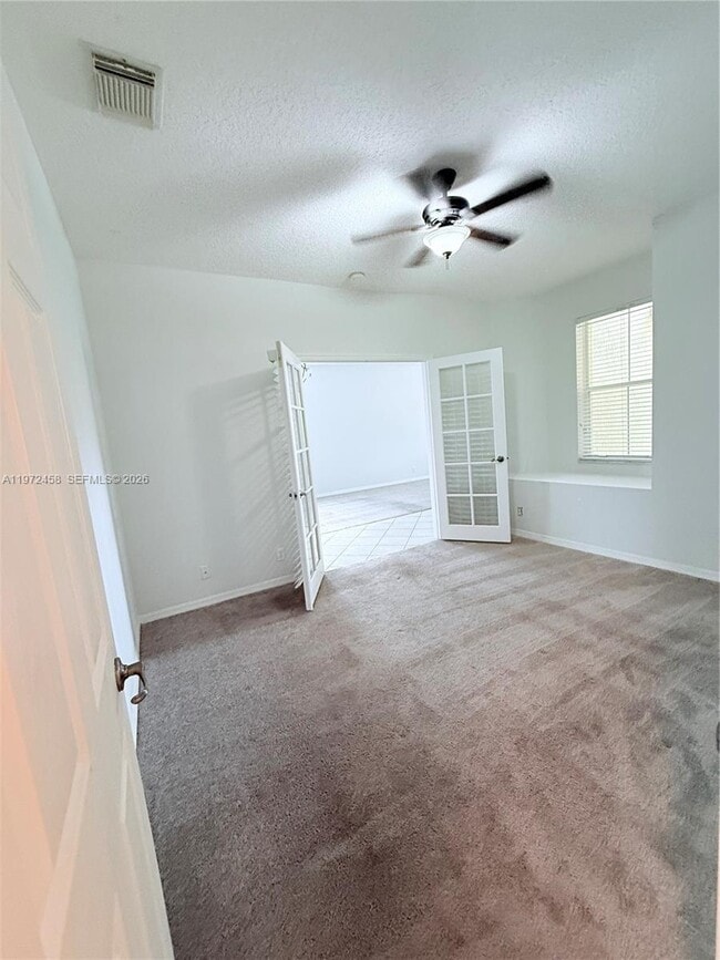 Building Photo - 5089 NW 121st Dr