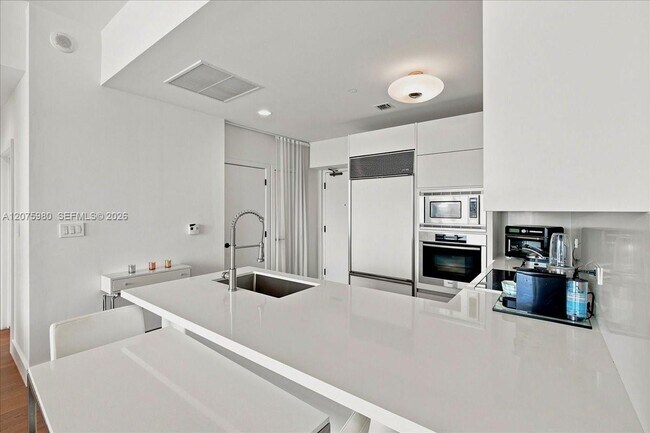 Building Photo - 6799 Collins Ave