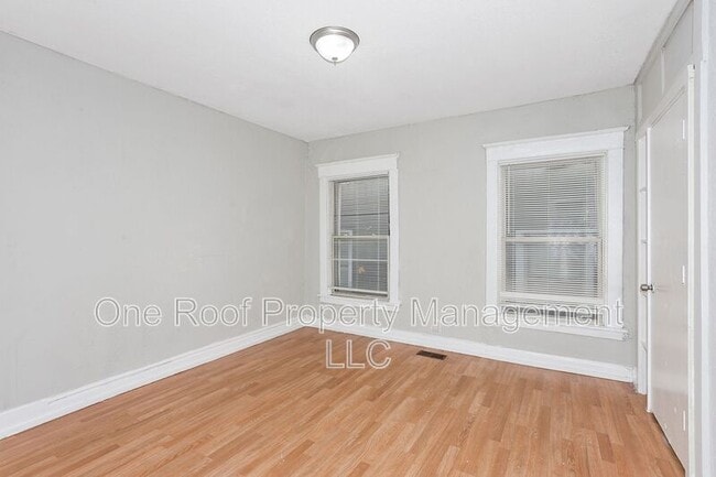 Building Photo - 3228-3230 E 8th St.