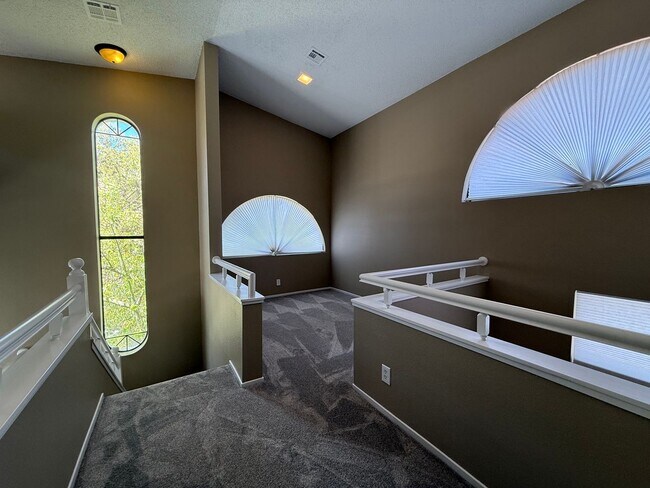 Building Photo - TWO BEDROOM TOWNHOME IN THE LAKES WITH GARAGE AND ATTACHED CARPORT