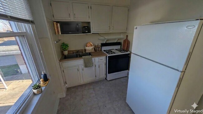 Building Photo - 3943 Glenmore Ave