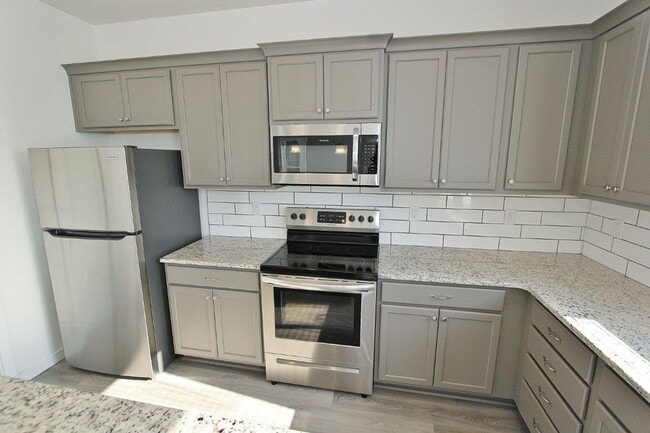Building Photo - Modern townhouse in a Cozy Community. 50% ...