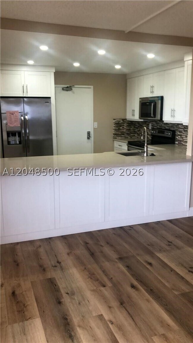 Building Photo - 10777 W Sample Rd