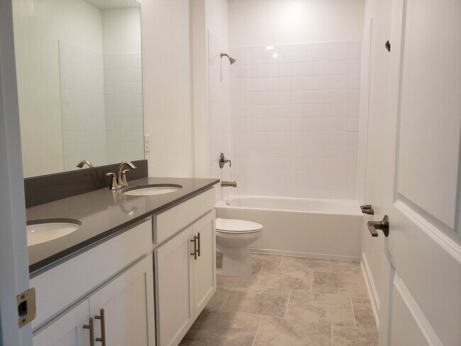 Building Photo - Bridgewalk Corner Lot Home with Wooded View and Solar Panels