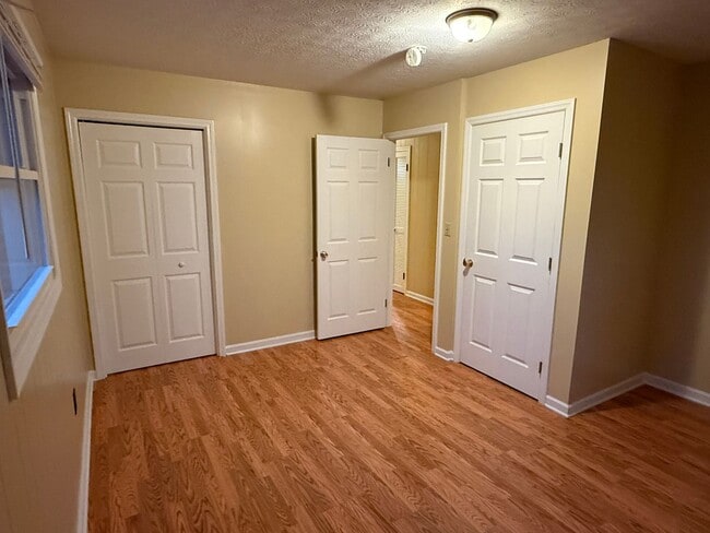 Building Photo - Updated 4BR Home with Finished Basement & Level Yard