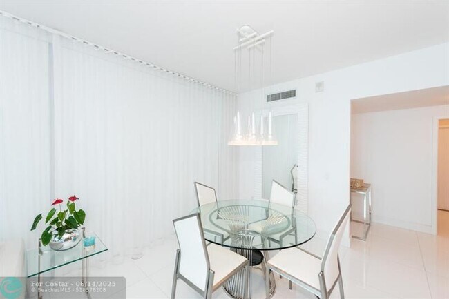Building Photo - 6899 Collins Ave