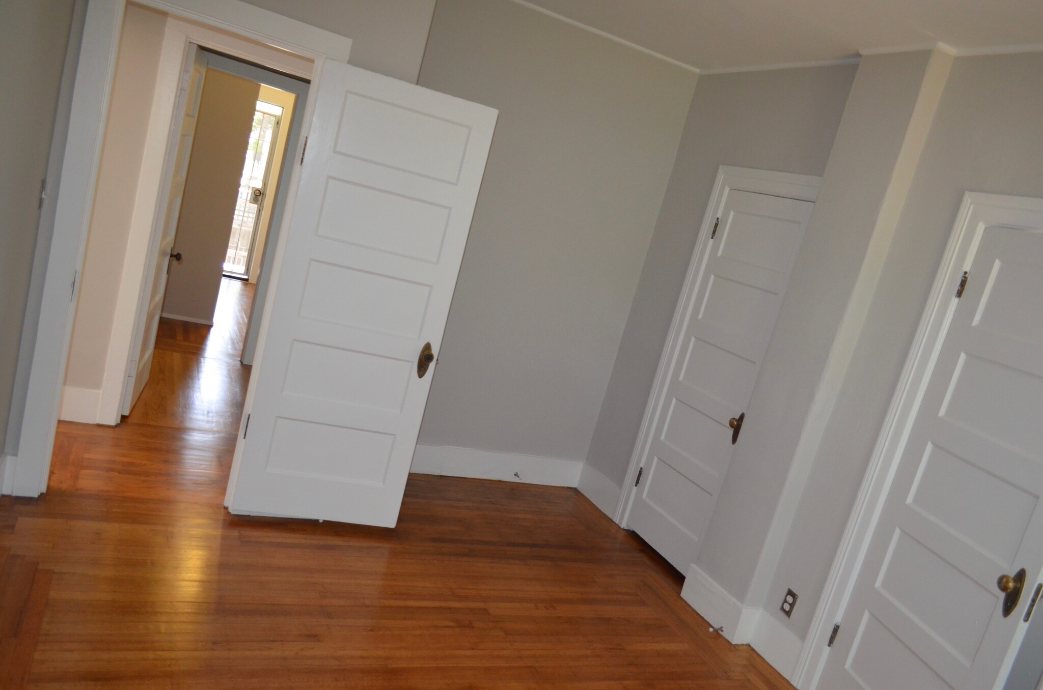 view from 2nd bedroom to entrance hallway - 568 Merrimac St