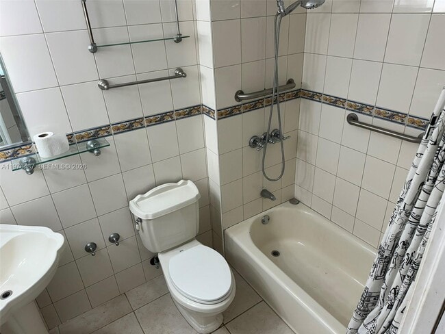 Building Photo - 10210 Collins Ave