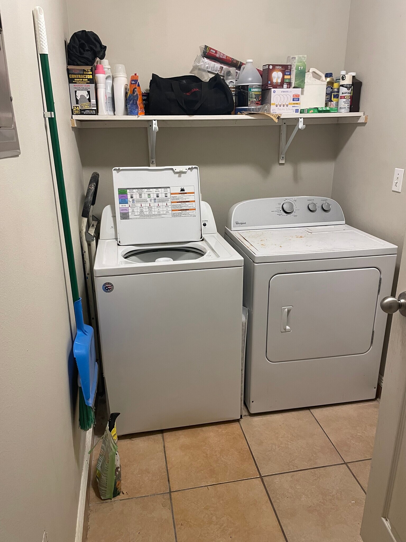 Laundry room off kitchen and with door to back patio - 2607 Ringold Cir