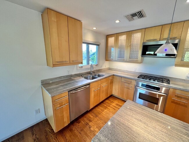Building Photo - Spacious 3BR Bluff Heights Home | Gated Yard, Garage & Modern Upgrades