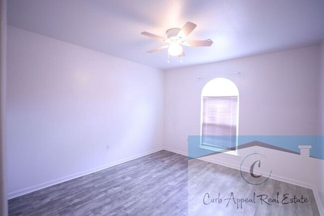 Building Photo - First month move in special $900!! Beautiful 3-bed, 2 bath condo with 2-car garage - includes was...